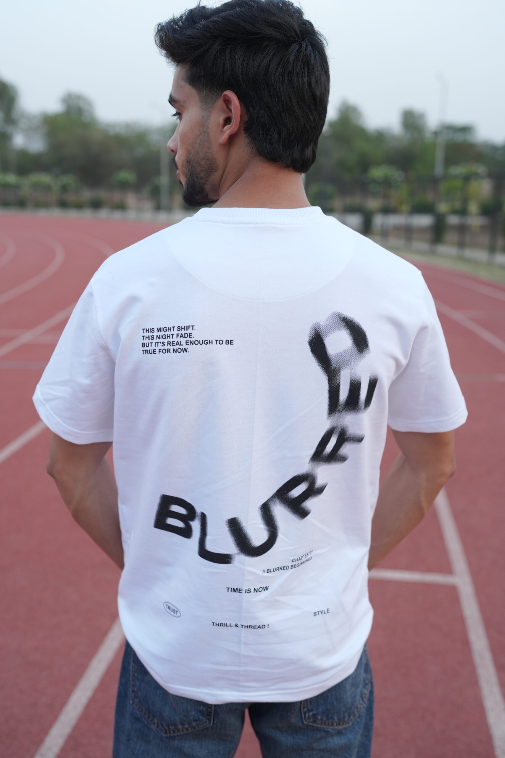 Thrill and Thread Blurred T-shirt design - White